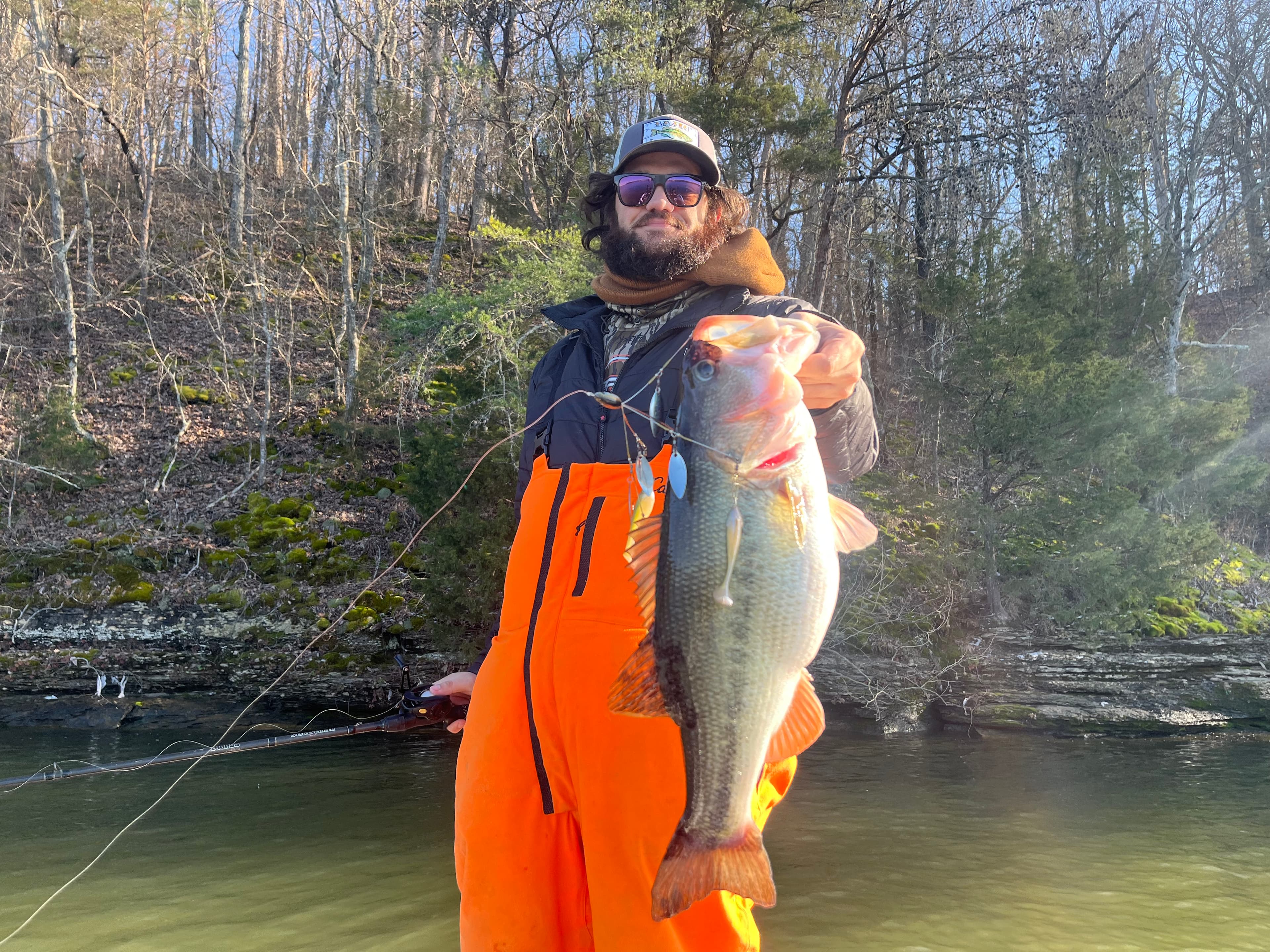 Harbor Lovin holding a bass on Kentucky Lake